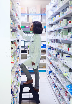 Buy stock photo Shot of a pharmacist working in a pharmacy