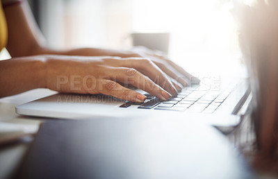 Buy stock photo Cropped shot of an unrecognizable female designer working in her home office