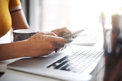 Buy stock photo Woman, hands and phone at a laptop desk for work networking and employee typing. Female worker, table and social network app with mobile communication and text for professional and web connection