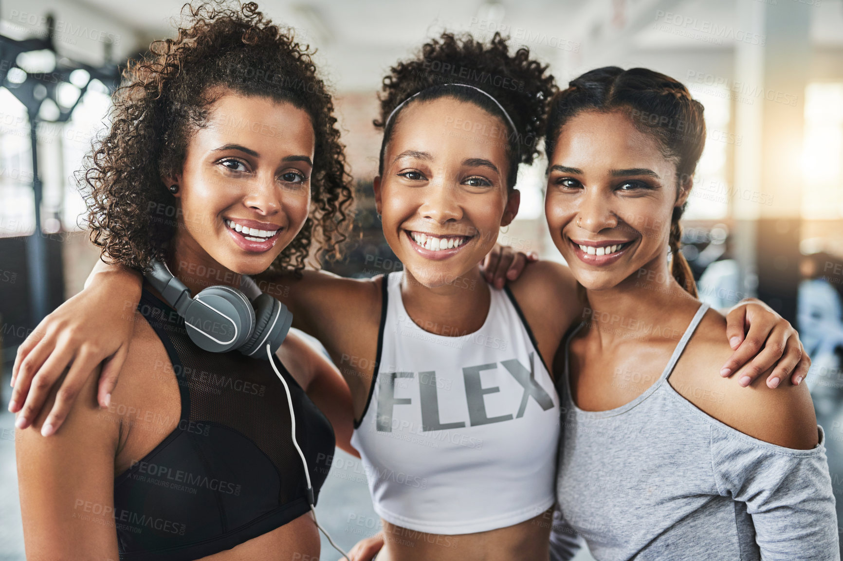 Buy stock photo Shot of a group of happy young women enjoying their time together at the gym