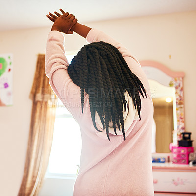 Buy stock photo Rearview shot of an unrecognizable little girl stretching in her bedroom