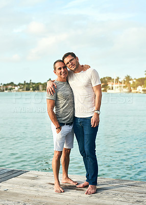 Buy stock photo Shot of an affectionate mature couple on the beach