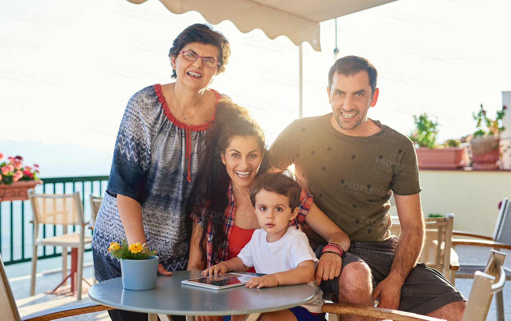 Buy stock photo Cropped portrait of an affectionate family of four outside