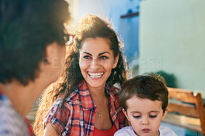Buy stock photo Cropped shot of an attractive young woman and her son visiting her mature mother