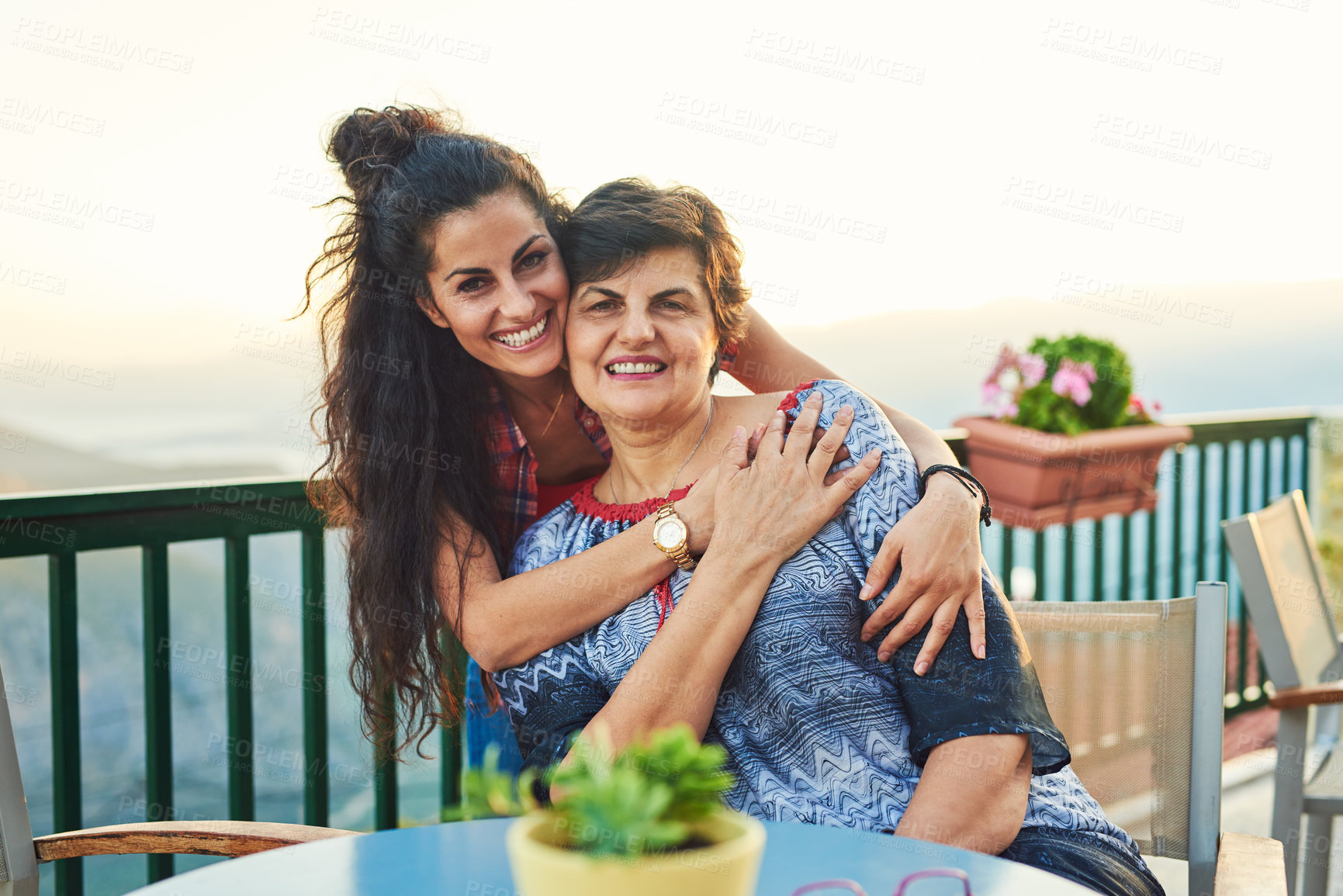 Buy stock photo Cropped portrait of an attractive young woman spending quality time with her mother