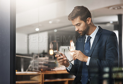 Buy stock photo Business, typing and man in office, smartphone and internet for social media, thinking and connection. Person, lawyer or attorney with cellphone, glasses or mobile user with network or online reading