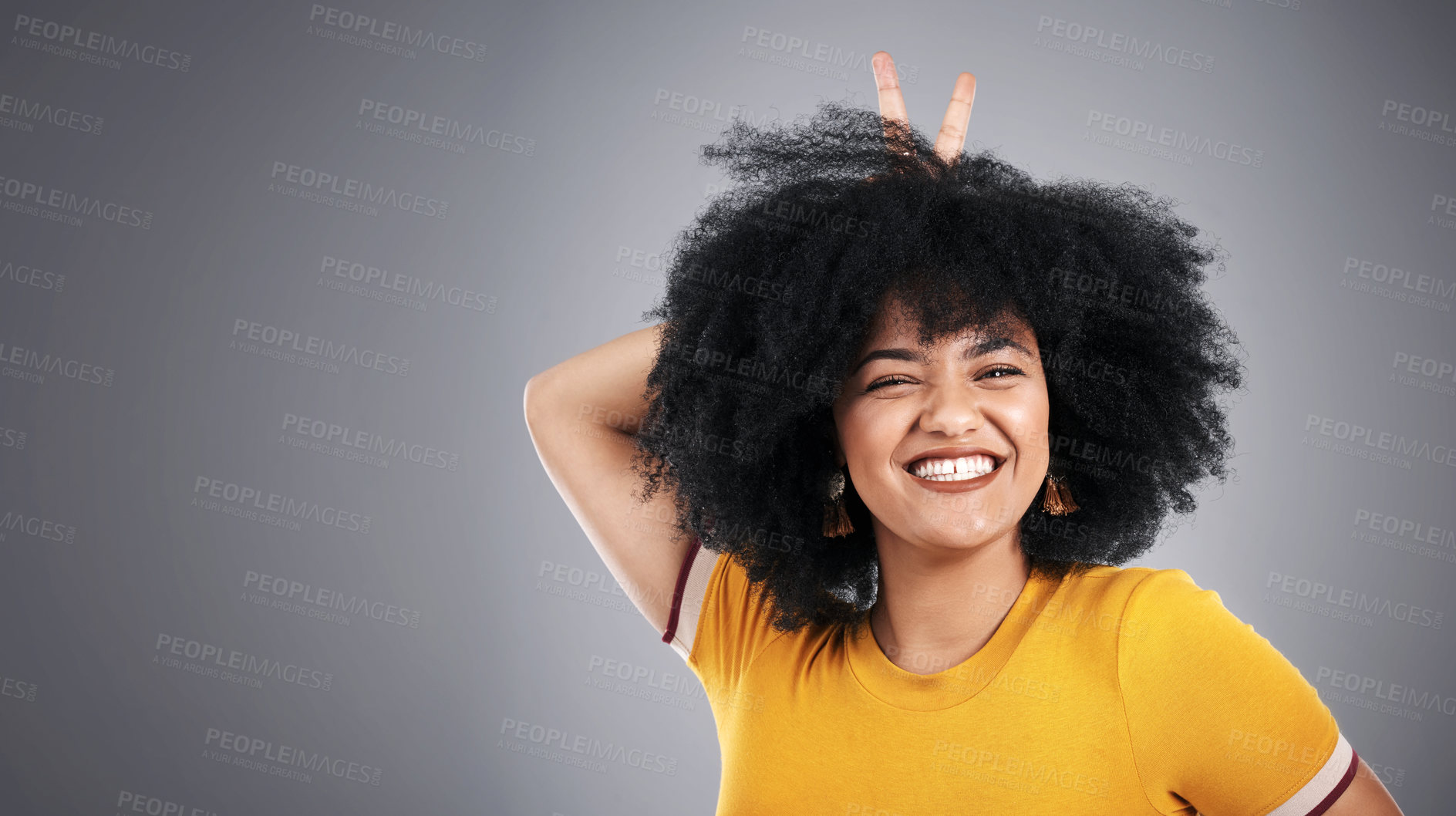 Buy stock photo Woman, peace sign and portrait of fashion, aesthetic and smile for clothes, stylish and confidence of girl. Afro, happy and female person with gesture, tshirt and pride with hair for model in studio