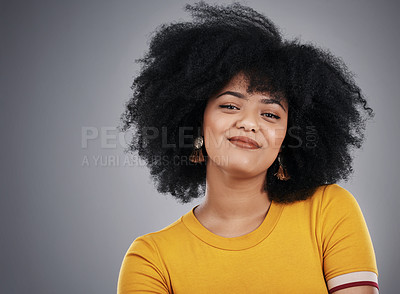 Buy stock photo Studio shot of an attractive young woman posing against a grey background