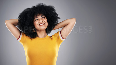 Buy stock photo Thinking, girl and ideas with choice, planning and problem solving on grey studio background. Person, woman and model with afro and thoughts with decision and smile with questions and inspiration
