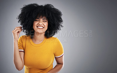 Buy stock photo Natural, beauty and woman with African hair care in studio, background and mock up with happiness. Cosmetics, treatment and girl with eco friendly makeup, skincare or pride in afro texture or style