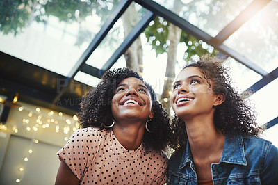 Buy stock photo Women, thinking and friends with smile at party for social gathering together for New Year event. Ideas, roof lights and happy people in lounge at evening for bonding, entertainment and celebration