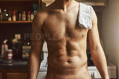 Buy stock photo Cropped shot of an unrecognizable shirtless man in the kitchen at home