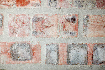 Buy stock photo Closeup of weathered facebrick wall and copy space on exterior of a home, house or city building. Texture and detail background of rough archiecture construction design of red brick on old structure