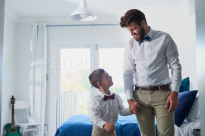 Buy stock photo Cropped shot of an adorable little boy and his father dressed in matching outfits