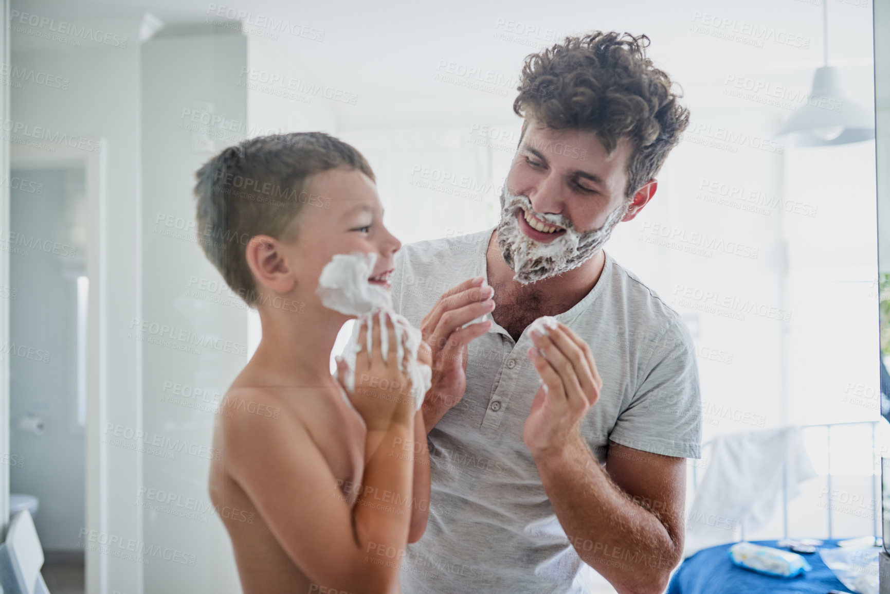 Buy stock photo Father, child and teaching how to shave in bathroom, having fun or bonding together. Smile, kid learning and dad shaving cream on face, playing and cleaning, hygiene and enjoying quality time in home