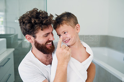 Buy stock photo Playful, bathroom and child with dad for washing, cleaning and hygiene in home together. Family, happy and father with young boy for learning skincare, wellness and health for morning routine