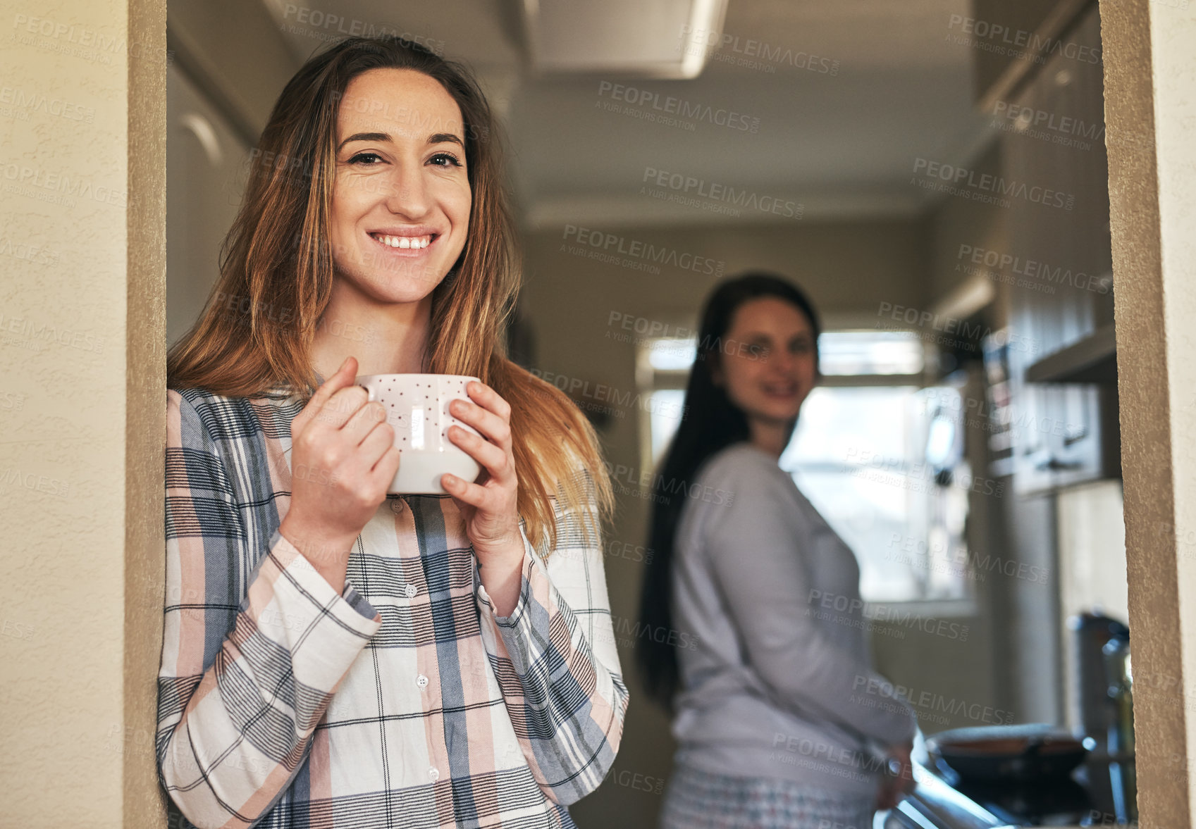 Buy stock photo Drinking coffee, portrait and happy woman in kitchen in home with friends. Smile, face and girl with herbal tea for peace, calm and enjoying morning espresso beverage and healthy latte for energy