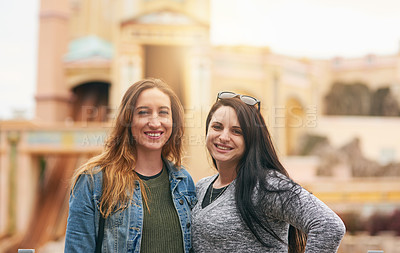 Buy stock photo Portrait of two female best friends at an amusement park outside