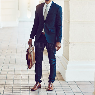 Buy stock photo Cropped shot of a stylishly dressed businessman in the city