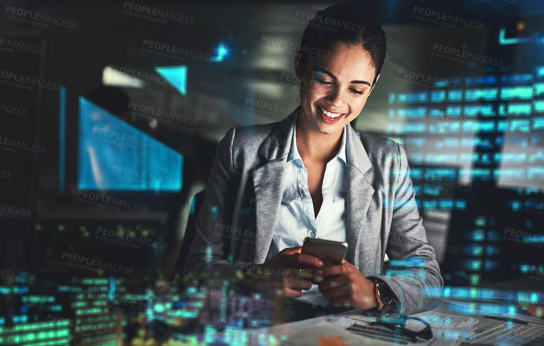 Buy stock photo Shot of a young businesswoman working late at night in a modern office superimposed over a cityscape