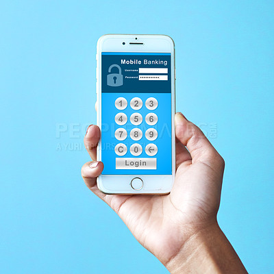 Buy stock photo Studio shot of an unrecognizable woman holding a cellphone displaying an internet banking webpage against a blue background