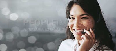 Buy stock photo Cropped portrait of a friendly female support agent working in an office against a digitally enhanced background