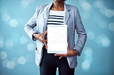 Buy stock photo Blank screen and copy space on a tablet with a woman showing a digital device. Closeup of female hands holding tech product. Person posing with and showing or promoting technology 