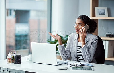Buy stock photo Business woman talking on phone call, networking and discussing a strategy while sitting at a desk alone at work. One happy corporate female professional making conversation while working in office