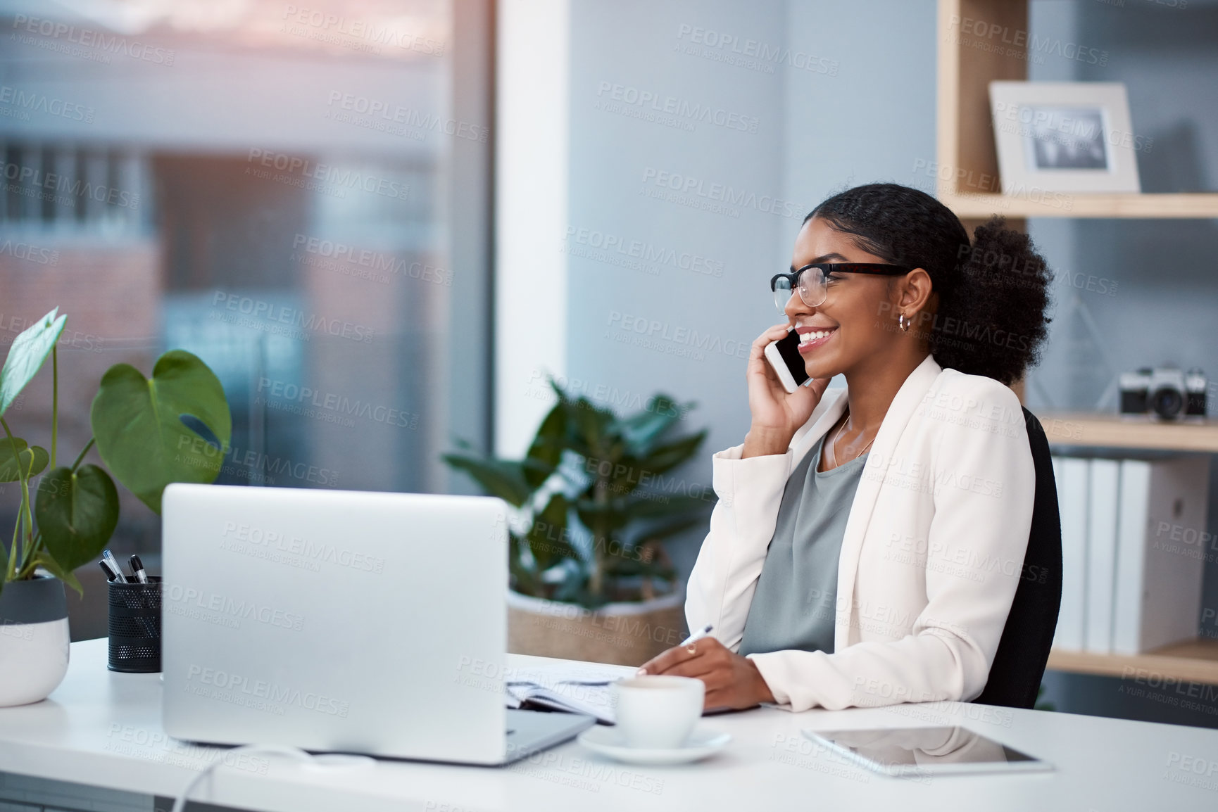 Buy stock photo Marketing agent talking on phone, networking with customers and negotiating successful deals on office technology. Smiling, happy and confident creative woman agreeing and sharing ideas with client