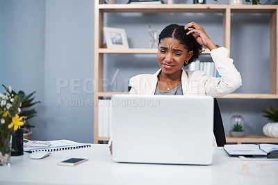 Buy stock photo Confused, stressed and angry business woman reading email and scratching her head thinking in her office. A young African American corporate female annoyed while working on a laptop at her workplace