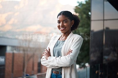 Buy stock photo Confident business woman with arms crossed standing outside of an office at work. Portrait of one happy, smiling and expert corporate professional with arms folded working at a startup company