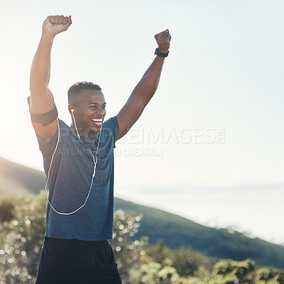 Buy stock photo Cropped shot of a handsome young male runner outdoors