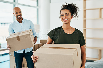 Buy stock photo Couple, portrait and smile with box in new home for property investment, relocation or moving. Happy, man and woman with cardboard package for homeowner mortgage, real estate or residence of marriage