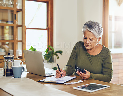 Buy stock photo Senior woman, budget planning and health insurance checklist with phone at home. Writing, contract and elderly female person with financial, tax and pension form in a house with bills and debt