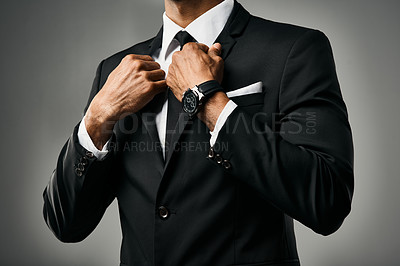 Buy stock photo Studio shot of a stylish unrecognizable businessman against a gray background