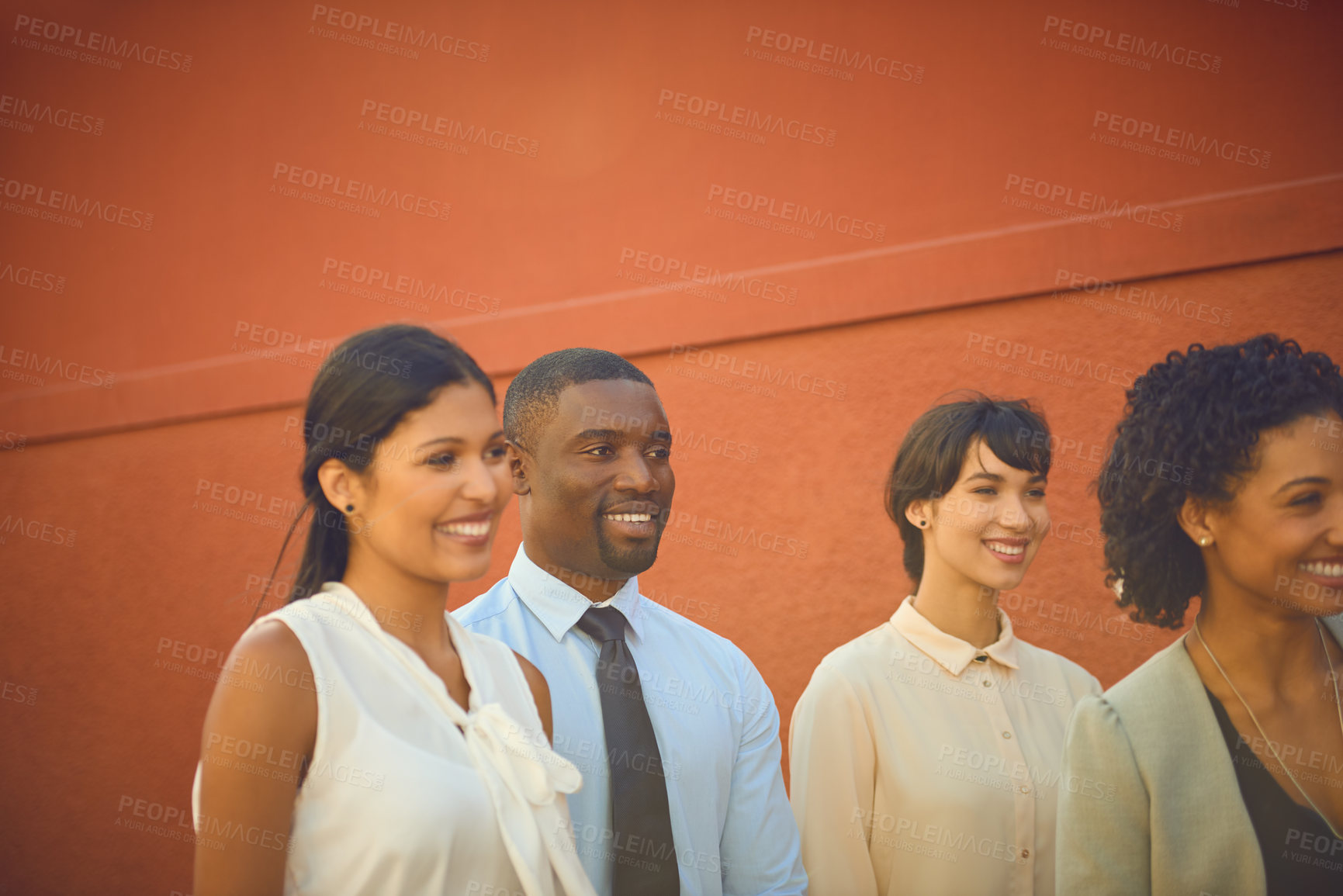 Buy stock photo Shot of a group of businesspeople standing outdoors