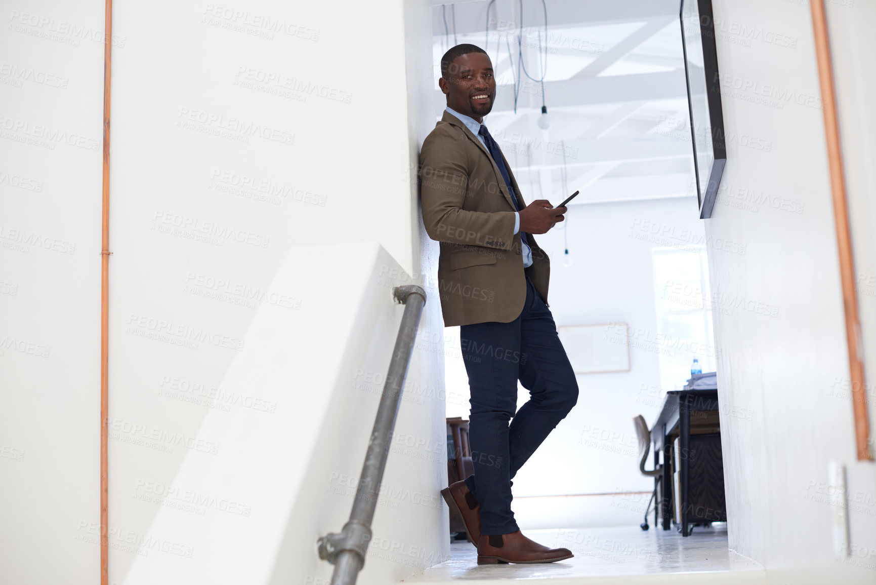 Buy stock photo Portrait, happy man and typing on cellphone in office for online contact, mobile technology or mockup. Black male worker, business and texting on smartphone, networking app or connect to social media