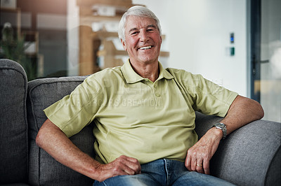 Buy stock photo Portrait of a senior man relaxing on the sofa at home