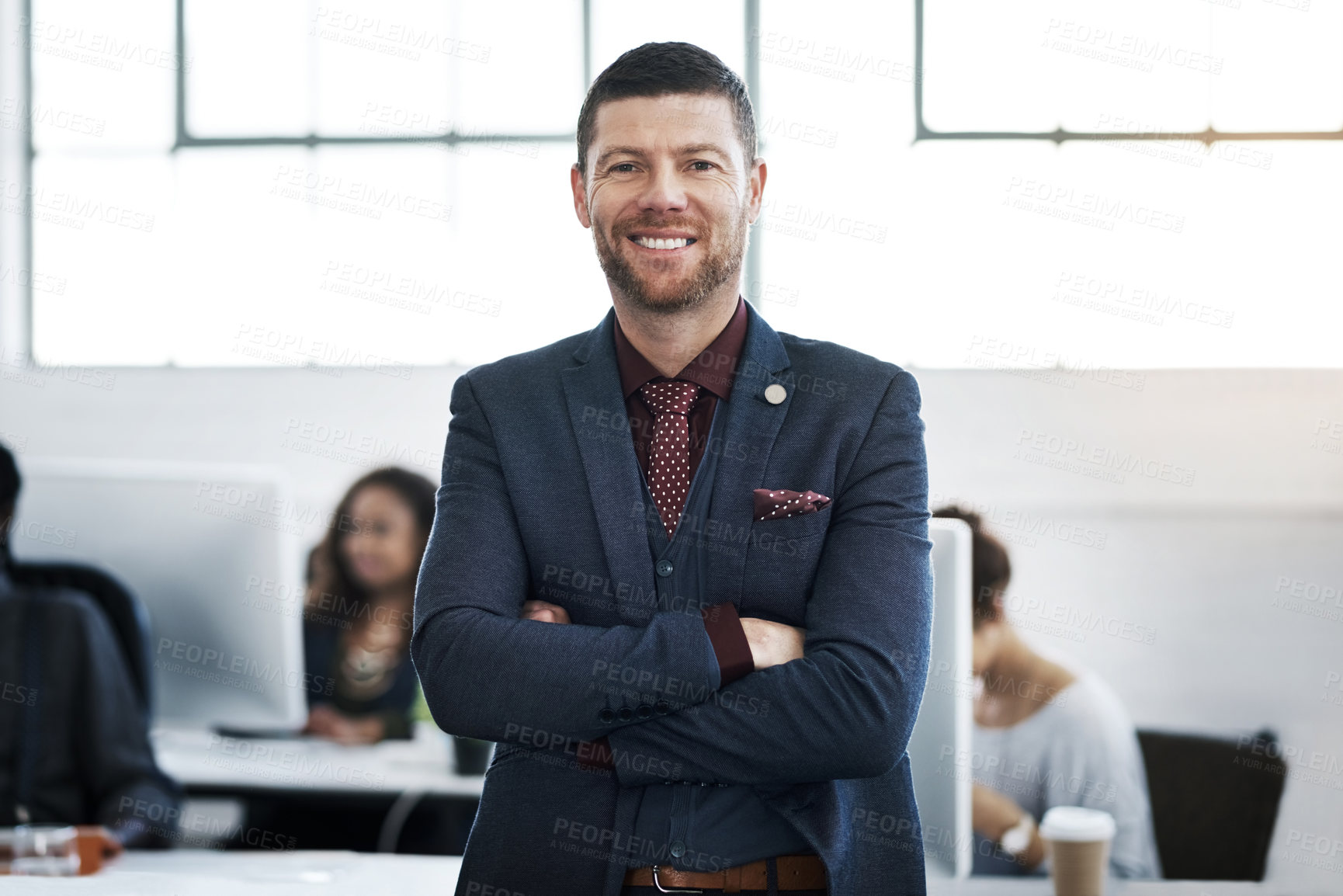 Buy stock photo Portrait of a confident mature businessman working in a modern office
