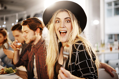 Buy stock photo Cropped shot of a young woman enjoying herself at a get together between friends