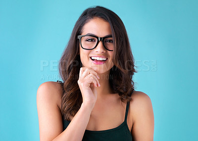 Buy stock photo Woman, smile and portrait with glasses on blue background with trendy optometry vision. Fashion, happy and designer eyewear with popular frames in studio with stylish, fashionable and prescription.