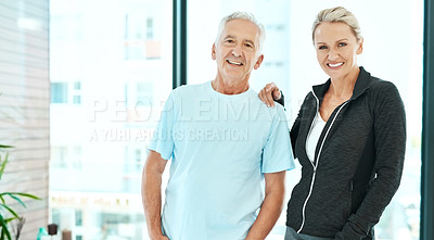 Buy stock photo Shot of a physiotherapist and her senior patient standing together