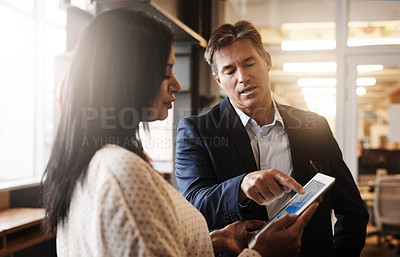 Buy stock photo Partner, people and explain in office with tablet for teamwork, collaboration and discussion on company growth. Employee, accountant and conversation with feedback, report and financial statistics