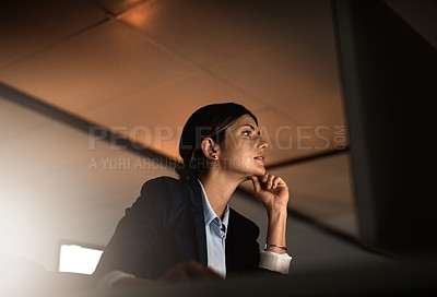 Buy stock photo Thinking, ideas and problem solving at night, woman in office reading email or online report at start up agency. Corporate overtime, challenge and focus, businesswoman at desk working late on idea.