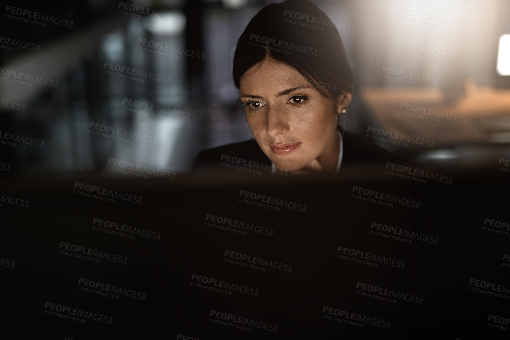 Buy stock photo Night, thinking and woman at desk with computer for research, web review or networking. Reading, internet search and consultant in office with online report, article or email ideas in dark workplace