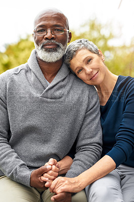Buy stock photo Cropped portrait of an affectionate senior couple enjoying some quality time in the park