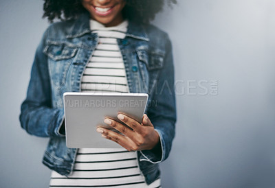 Buy stock photo Hands, scroll and woman with tablet in studio for email, contact or networking on internet search. Typing, mockup and girl on digital app for online chat, social media or web post on grey background