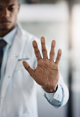 Buy stock photo Cropped shot of a young male scientist working on touchscreen technology while doing research in his lab