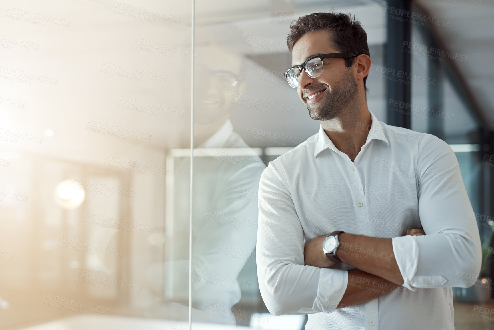 Buy stock photo Thinking, happy and business man with arms crossed in office on glass wall for insight, mindset or inspiration. Confident worker, idea and planning future, vision or reflection for view or job growth