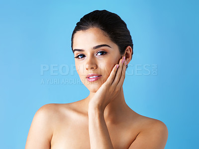 Buy stock photo Portrait, skincare and woman in studio with natural beauty, confident makeup and luxury cosmetics. Dermatology, facial care and girl with wellness, relax and healthy skin glow on blue background.